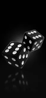 Sleek black dice wallpaper with reflective surface.