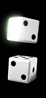 Two white dice on a black background.