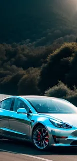 Sleek electric car on a scenic mountain road under sun.