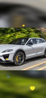 Silver electric car cruising on open road, sleek and modern design.