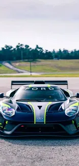 Sleek Ford GT racing car on a scenic road track.