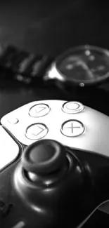 Black and white gaming controller with watch in background.