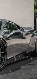 Sleek gray sports car with distinctive design in urban setting.