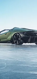 Green sports car on clear ice background, showcasing sleek design.