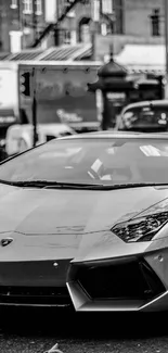 Black and white Lamborghini in urban setting.