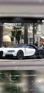 Black and white luxury sports car on city street.