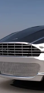 Sleek silver luxury car with chrome grille close-up.