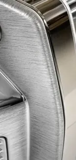 Close-up of metallic appliance showcasing sleek design.