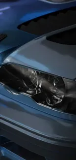 Close-up of a sleek metallic car headlight design.