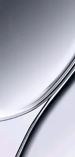 Sleek metallic wallpaper with smooth curves.