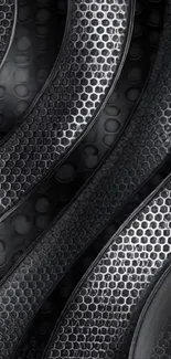 Dark metallic patterned wallpaper with hexagonal textures.