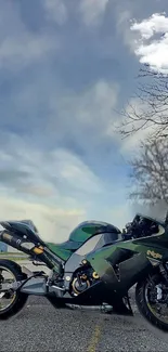 Motorcycle parked under a cloudy sky horizon.