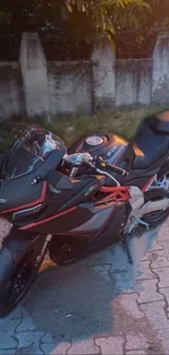 Sleek motorcycle parked on pavement in evening light.