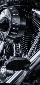 Monochrome motorcycle engine with chrome detailing in close-up.