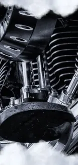 Monochrome close-up of a motorcycle engine with sleek chrome detailing.