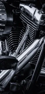 Close-up view of a detailed motorcycle engine in monochrome.