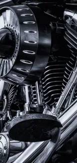 Close-up of sleek motorcycle engine in black and chrome finish.