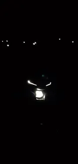 Mystical motorcycle illuminated in dark night scene.