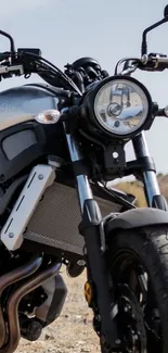 A sleek motorcycle parked in an outdoor setting.