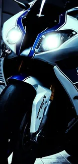 Sleek BMW motorcycle glowing at night in stunning wallpaper.