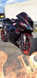 Black motorcycle with red accents on an urban road.