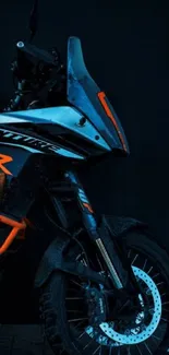 Dark motorcycle with orange accents wallpaper.