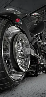 Close-up of a sleek motorcycle's rear wheel and chrome detailing.