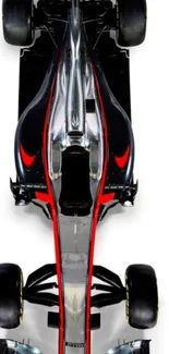 Top view of a sleek racing car on a white background.