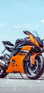 Sleek orange sports motorcycle on open road.