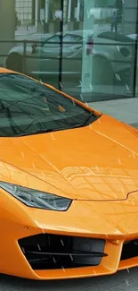 Orange sports car parked in urban setting with sleek design and modern aesthetic.