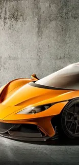 Orange sports car against a minimalist concrete wall.