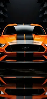 Front view of sleek orange sports car with black details.