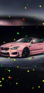 A sleek pink sports car with confetti on a dark background.