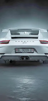 Porsche GT3 in stunning rear view angle, highlighting sleek design.