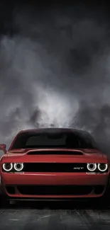 Red sports car in smoke-filled ambiance.