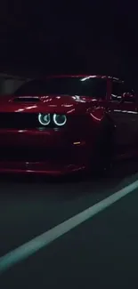 Red car speeding through a dimly lit tunnel, creating a dynamic and sleek look.