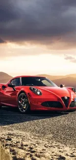 Sleek red sports car on scenic open road with dramatic sky.