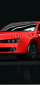 Sleek red sports car on a dark background.