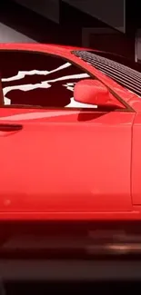 Sleek red car with modern design on display.