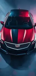 Top view of sleek red luxury car with dramatic lighting.