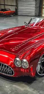 Vibrant red classic car parked in a garage.