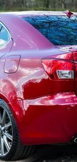 Sleek red Lexus car side view wallpaper perfect for automotive enthusiasts.