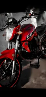 Sleek red motorcycle with a modern design on a dark background.