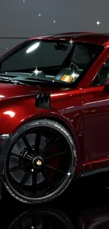 Glossy red sports car with sleek black wheels.