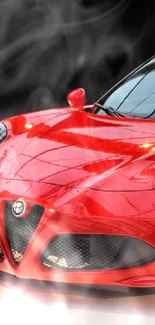 Red sports car with sleek design, parked indoors.