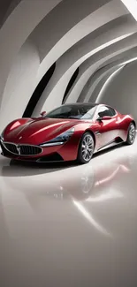 Sleek red sports car in a modern tunnel.