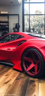 Sleek red sports car parked indoors.