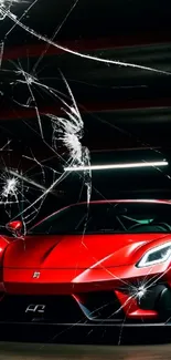 Sleek red supercar with cracked glass effect background.