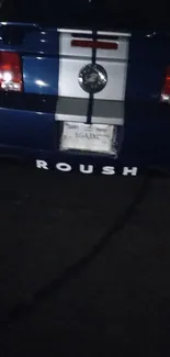 Roush car rear at night with sporty design.