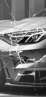 Artistic black and white silver car with cracked glass effect.